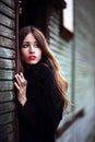 Magnificent charming gipsy close up portrait colorful dress and fur coat dressed outdoor