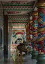 The magnificent of Chinese-style temple corridor with sculptured dragons pillars, Large incense burner decorated with dragon