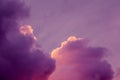 Magnificent colorful clouds in the evening sky. Bright, pink clouds in the sky at sunset. Beautiful evening skyscape. Abstract, pu Royalty Free Stock Photo