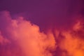 Magnificent colorful clouds in the evening sky. Bright, pink clouds in the sky at sunset. Beautiful evening skyscape. Abstract, pu Royalty Free Stock Photo