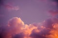 Magnificent colorful clouds in the evening sky. Bright, pink clouds in the sky at sunset. Beautiful evening skyscape. Abstract, pu Royalty Free Stock Photo