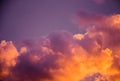 Magnificent colorful clouds in the evening sky. Bright, pink clouds in the sky at sunset. Beautiful evening skyscape. Abstract, pu Royalty Free Stock Photo