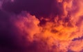 Magnificent colorful clouds in the evening sky. Bright, pink clouds in the sky at sunset. Beautiful evening skyscape. Abstract, pu Royalty Free Stock Photo