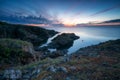 Magnificent colorful seascape with picturesque rocks in sunrise time