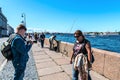 Russia, St. Petersburg, July 2020. People on the embankment of the city on a day off.