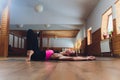 magnificent exit from the bridge Beautiful woman practices backbend yoga asana Urdhva Dhanurasana - Upward facing bow Royalty Free Stock Photo