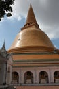 Magnificent exterior ancient Thai golden stupa.