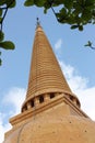 Magnificent exterior ancient Thai golden stupa.