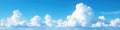Magnificent fluffy white cloudscape, deep blue sky background , unburdened, day Royalty Free Stock Photo
