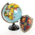 Magnificent Globe and Shield isolated on white background Royalty Free Stock Photo