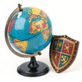 Magnificent Globe and Shield isolated on white background Royalty Free Stock Photo