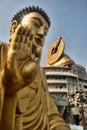 A magnificent golden statue of Buddha in the mountains, Taiwan