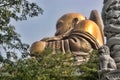 A magnificent golden statue of Buddha in the mountains, Taiwan