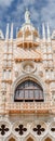 Magnificent main facade with luxurious balcony and statues with roof decorations of Doge Palace in Venice at San Marco square, Royalty Free Stock Photo