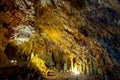 The magnificent and majestic caves of Diros in Greece. A spectacular sight of stalacites and stalagmites.