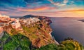 Magnificent morning view of Santorini island. Fantastic summer sunrise onfamous Greek resort Fira, Greece, Europe. Wonderful Medit