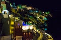 Scenic view of Fira town night lights Santorini summertime Greece Royalty Free Stock Photo