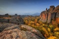 Magnificent night view of the Belogradchik rocks, Bulgaria. Autumn scene, car trails Royalty Free Stock Photo