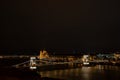 The magnificent Parliament building in Budapest, right on the banks of the Danube at night