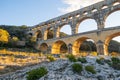 The magnificent Pont du Gard, at setting sun., ancient Roman aqueduct bridge. Photography taken in Provence, southern France Royalty Free Stock Photo