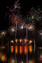 Magnificent rich fireworks over Brno`s Dam with lake reflection on the surface Royalty Free Stock Photo