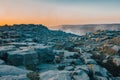 Magnificent rock formations in the Dettifoss area in Iceland during summer sunset, blue rock surrounded by beautiful orange light