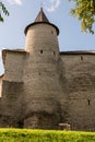 Pskov, Russia, September 6, 2023. Trinity tower of the Kremlin and a fragment of the fortress wall.