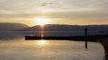 Magnificent scenery .man picturing sunset over lake prespa in macedonia