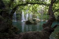 The magnificent Selale Waterfall surrounded by a forest of trees at Antalya in Turkey.