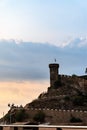 Tossa de Mar, Spain, August 2018. Silhouette of a medieval fortress against the sunset sky. Royalty Free Stock Photo