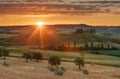 Magnificent spring landscape at sunrise.Beautiful view of typical tuscan farm house, green wave hills.