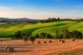 Magnificent spring landscape at sunrise.Beautiful view of typical tuscan farm house Royalty Free Stock Photo