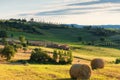 Magnificent spring landscape at sunrise. Beautiful view of typical tuscan farm house Royalty Free Stock Photo