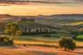 Magnificent spring rural landscape. Stunning view of tuscan green wave hills, amazing sunlight, beautiful golden fields and meadow Royalty Free Stock Photo