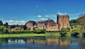 Stokesay Castle in Craven Arms, Shropshire - As seen from across its pond! Royalty Free Stock Photo