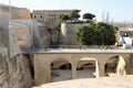 Valletta, Malta, August 2019. The bridge over the castle moat at the entrance to the city. Royalty Free Stock Photo