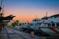 Magnificent sunset color in marina harbor. End of a warm sunny day in Ibiza, St Antoni de Portmany, Spain. Royalty Free Stock Photo