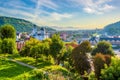 Scenic view from fortified city of Sighisoara down to lower city and Tarnava Mare river valley during sunrise, Romania Royalty Free Stock Photo