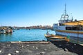 Marsaxlokk, Malta, August 2019. View of the harbor from the old pier.