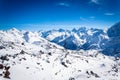 Magnificent view of the snow-white towering mighty mountains Elbrus and the cable ways, ski resort, Kabardinobalkaria, Russia