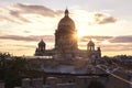 A magnificent view of St. Isaac`s Cathedral at sunset from the rooftops. Top view of the city of St. Petersburg. Beautiful sunset Royalty Free Stock Photo