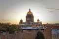 A magnificent view of St. Isaac`s Cathedral at sunset from the rooftops. Top view of the city of St. Petersburg. Beautiful sunset Royalty Free Stock Photo