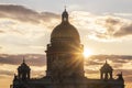 A magnificent view of St. Isaac`s Cathedral at sunset from the rooftops. Top view of the city of St. Petersburg. Beautiful sunset Royalty Free Stock Photo