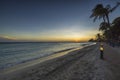 Magnificent view of sunset in Atlantic ocean from sandy beach of island of Aruba.. Royalty Free Stock Photo