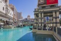 A magnificent view of the Venetian hotel-casino with blue water of an artificial canal and gondolas. Las Vegas. Royalty Free Stock Photo