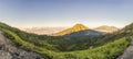 The magnificent views on green mountains from a mountain road trecking to the Ijen volcano or Kawah Ijen on the Royalty Free Stock Photo