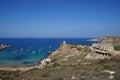 Magnificent views of Riviera Beach and the small watchtower Ghajn Tuffieha Tower, Mellieha, Malta. Royalty Free Stock Photo