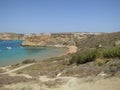 Magnificent views of Riviera Beach and the small watchtower Ghajn Tuffieha Tower, Mellieha, Malta. Royalty Free Stock Photo