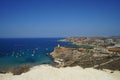 Magnificent views of Riviera Beach and the small watchtower Ghajn Tuffieha Tower, Mellieha, Malta. Royalty Free Stock Photo