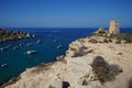 Magnificent views of Riviera Beach and the small watchtower Ghajn Tuffieha Tower, Mellieha, Malta. Royalty Free Stock Photo